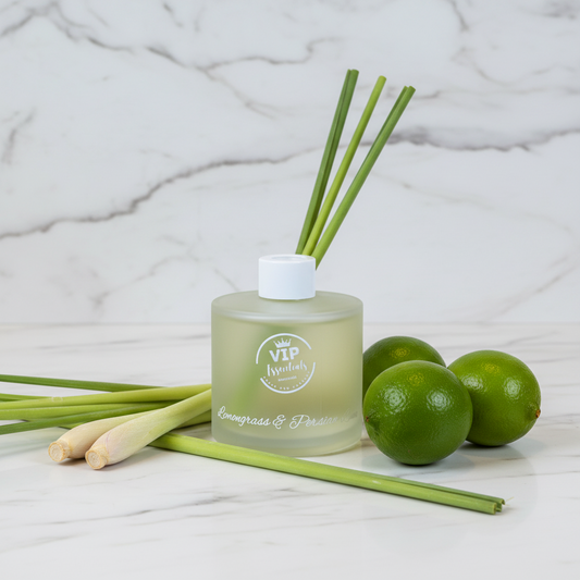 Bottle of VIP Essentials lemon grass and Persian lime product on a blue background