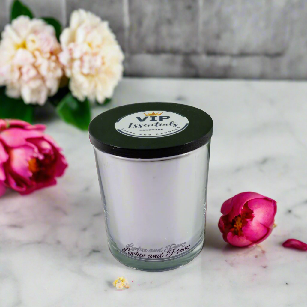 Glass jar with a black lid labeled 'VIP Essentials' on a white background