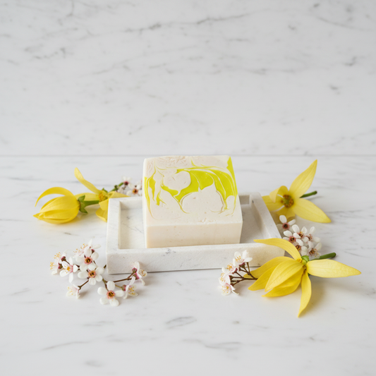 Square soap with green and beige design on a white background