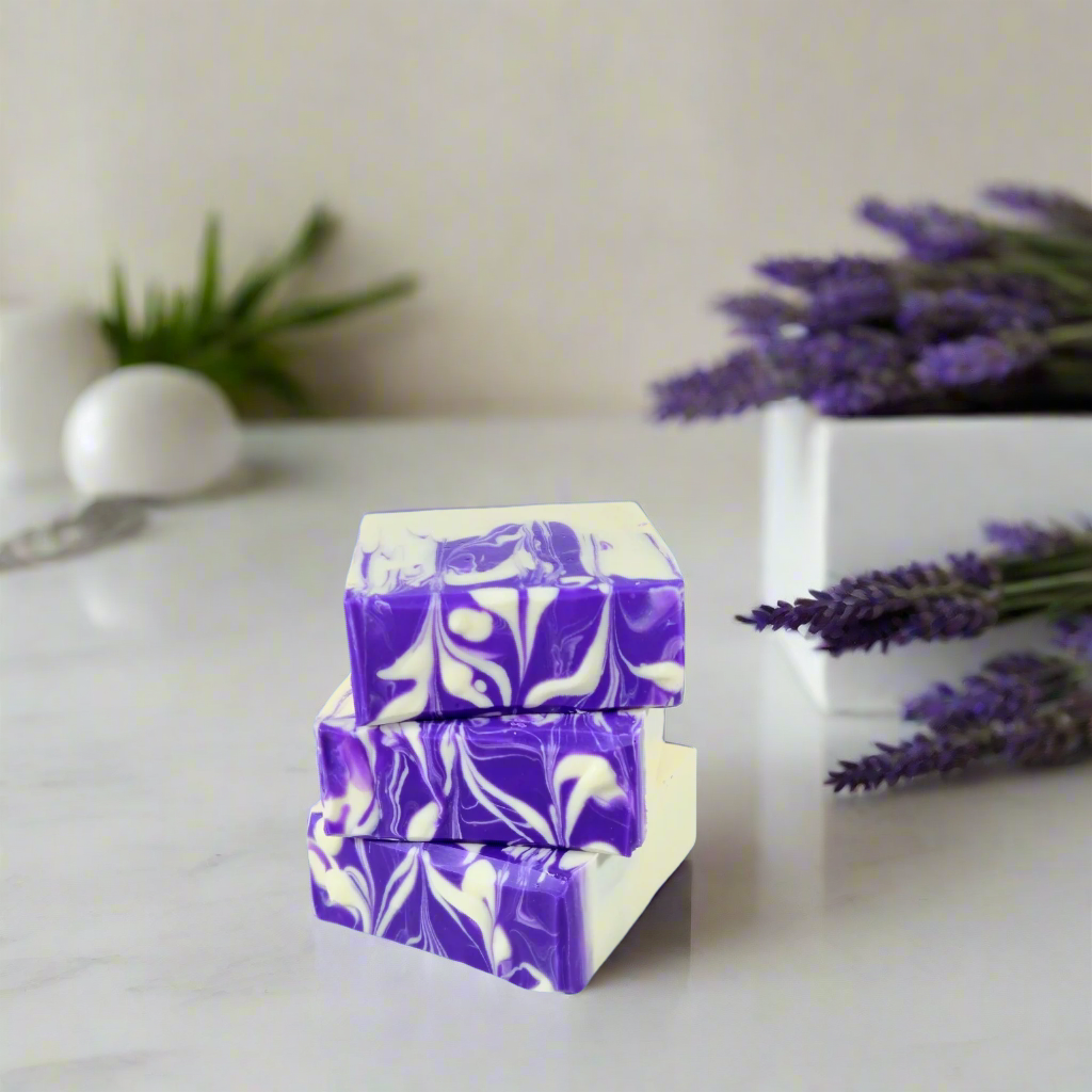 Purple and white marbled soap bars on a blue background