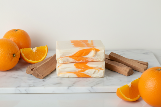 Bar of soap with orange and white swirls on a blue background